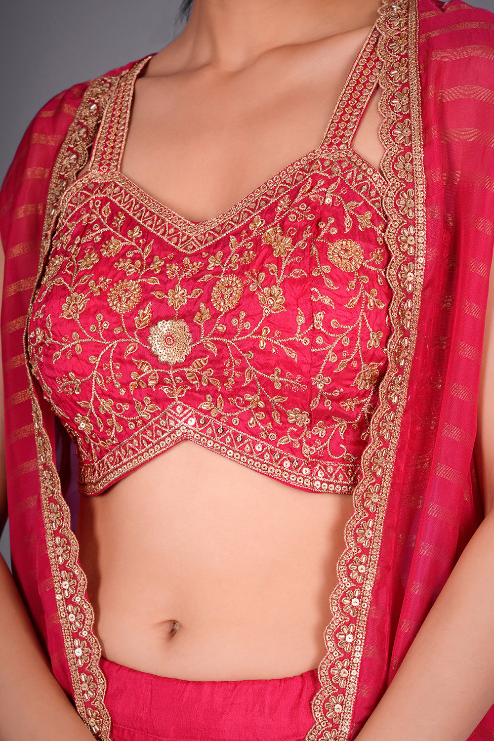 Rani Pink Suit with Embroidered Bustier and Leheriya Cape