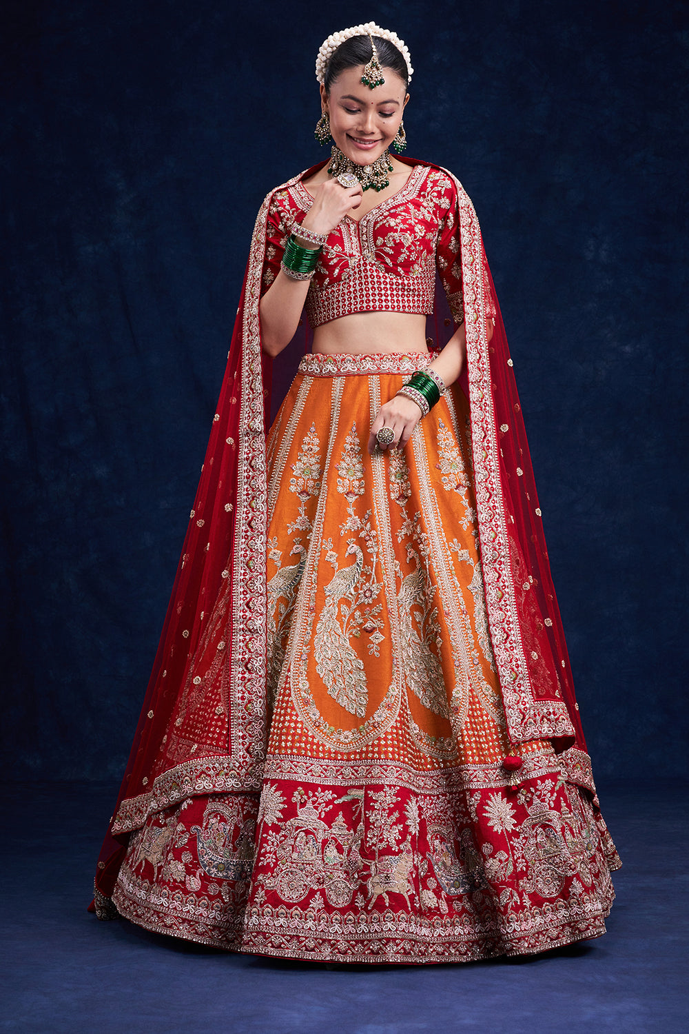 Red and Orange Raw Silk Bridal Lehenga with Cutdana Work