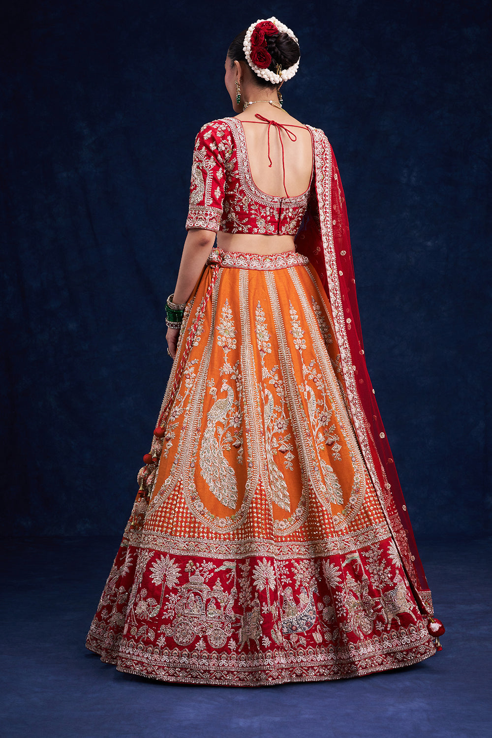 Red and Orange Raw Silk Bridal Lehenga with Cutdana Work