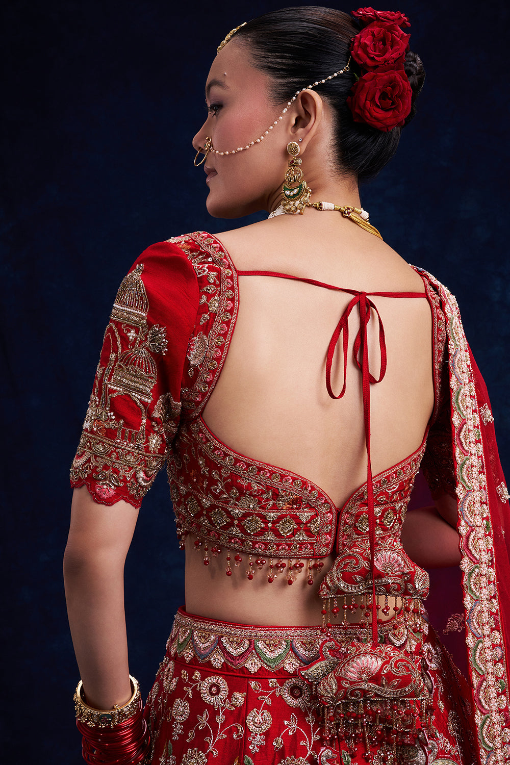 Red Raw Silk Bridal Lehenga with Sequins and Resham Work