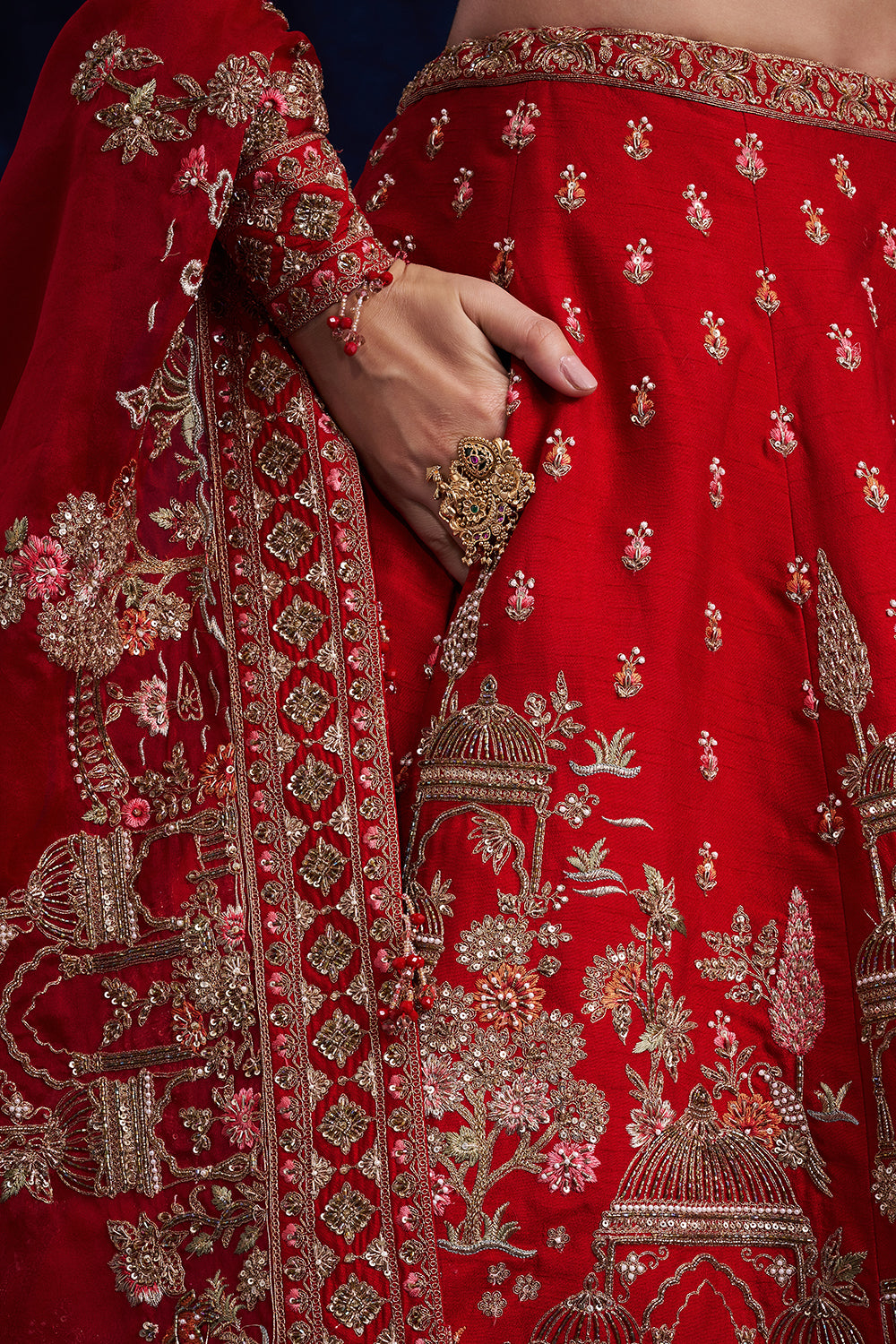 Red Raw Silk Bridal Lehenga with Sequins and Resham Work