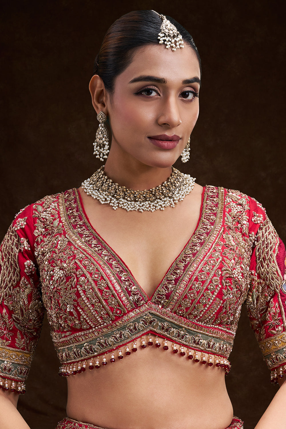 Red Raw Silk Bridal Lehenga with Zardozi Heritage Motifs