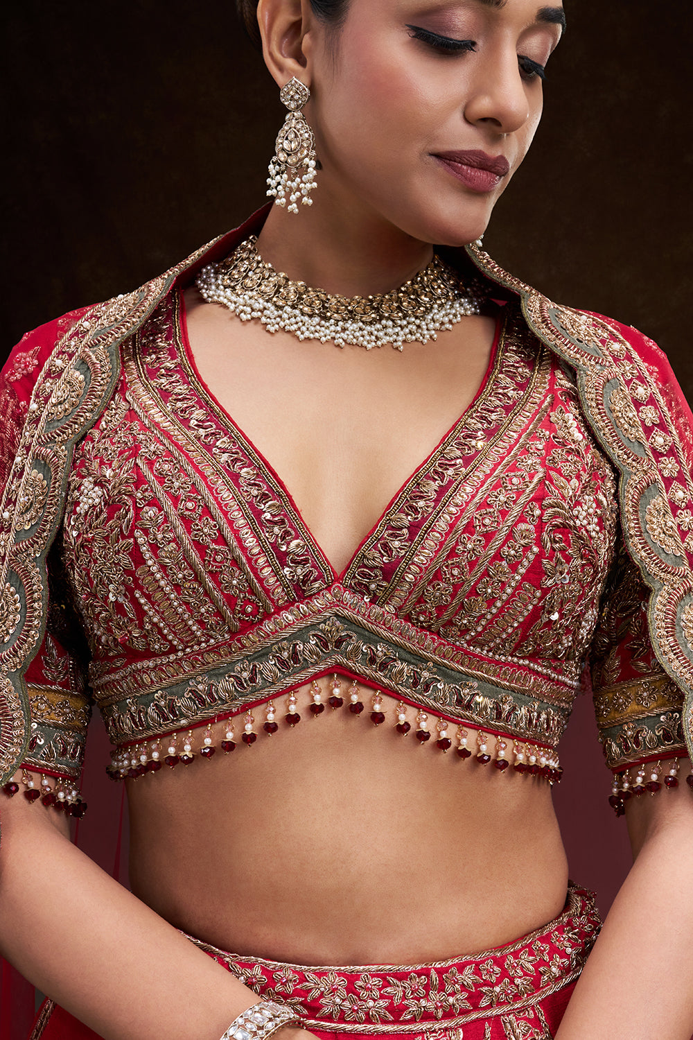 Red Raw Silk Bridal Lehenga with Zardozi Heritage Motifs