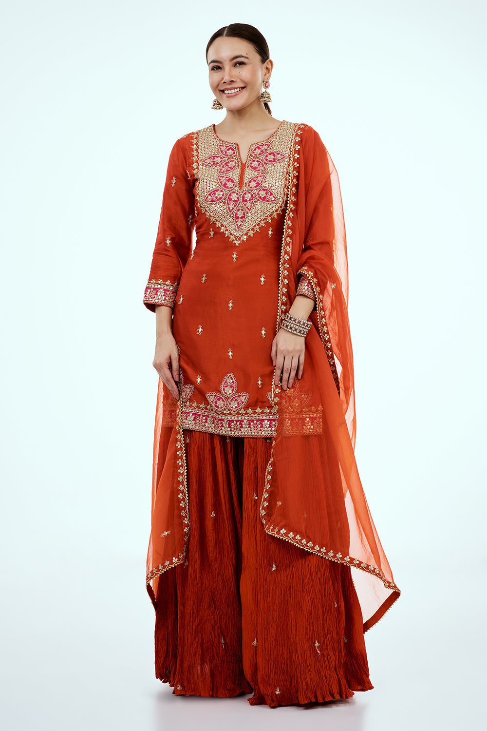 Rust Art Silk Palazzo Suit with Gota Work