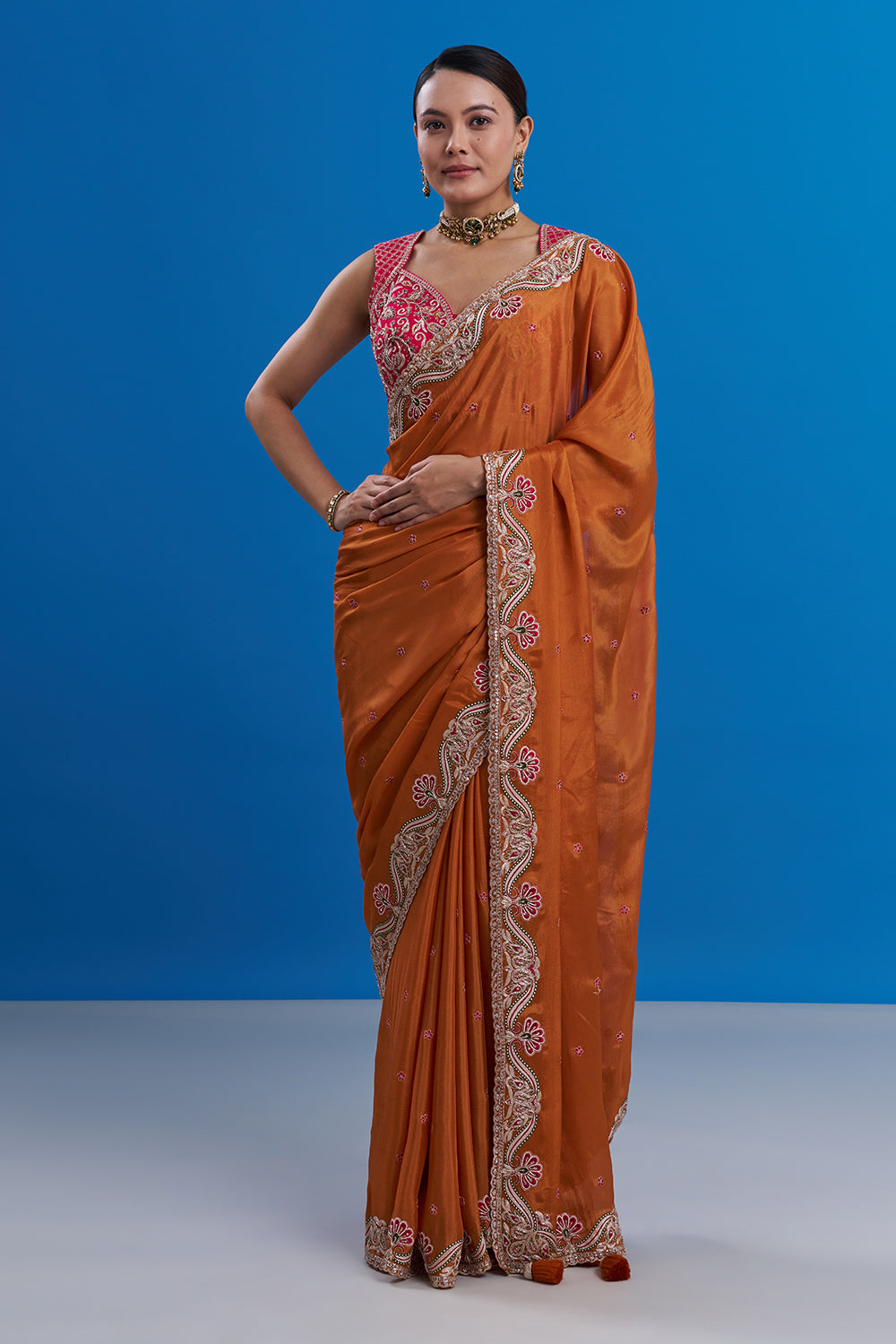 Rust Orange Pure Chiffon Saree with Gold Zari Work And Stitched Blouse