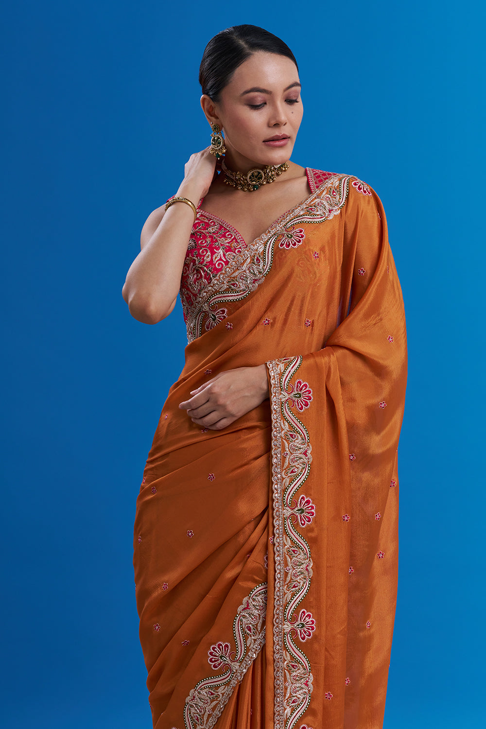 Rust Orange Pure Chiffon Saree with Gold Zari Work And Stitched Blouse