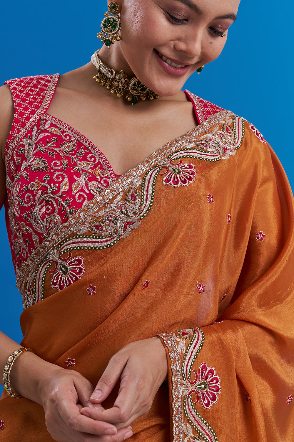 Rust Orange Pure Chiffon Saree with Gold Zari Work And Stitched Blouse