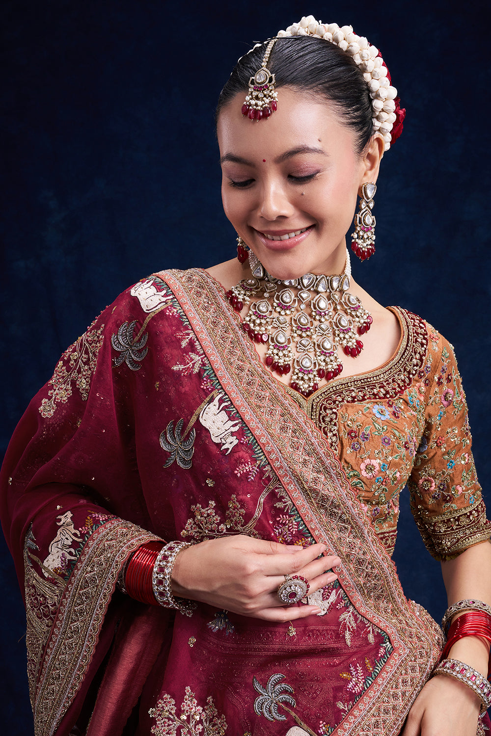 Rust Red Raw Silk Bridal Lehenga with Regal Zardozi Work