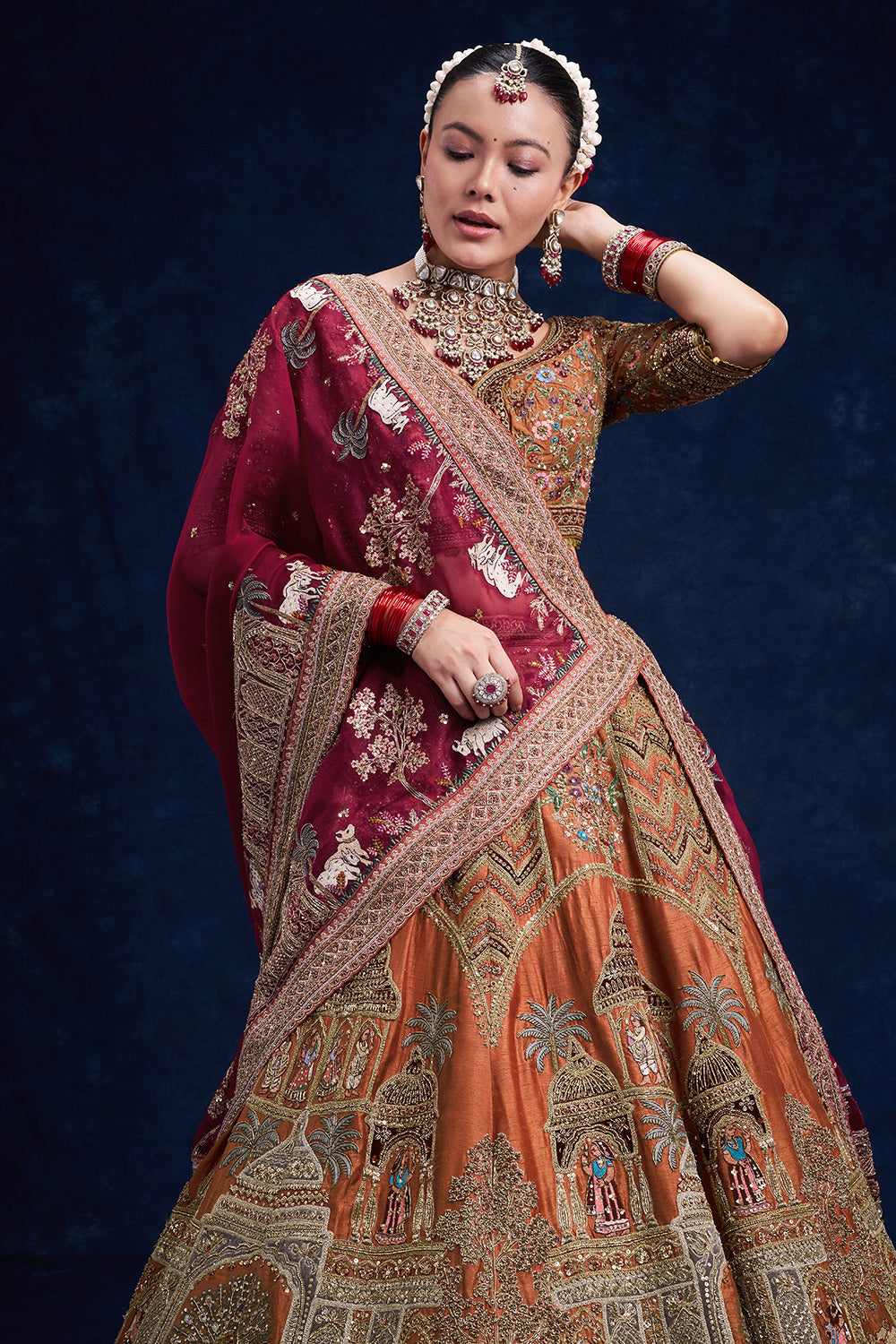 Rust Red Raw Silk Bridal Lehenga with Regal Zardozi Work