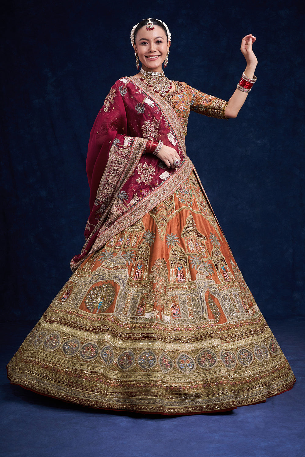 Rust Red Raw Silk Bridal Lehenga with Regal Zardozi Work