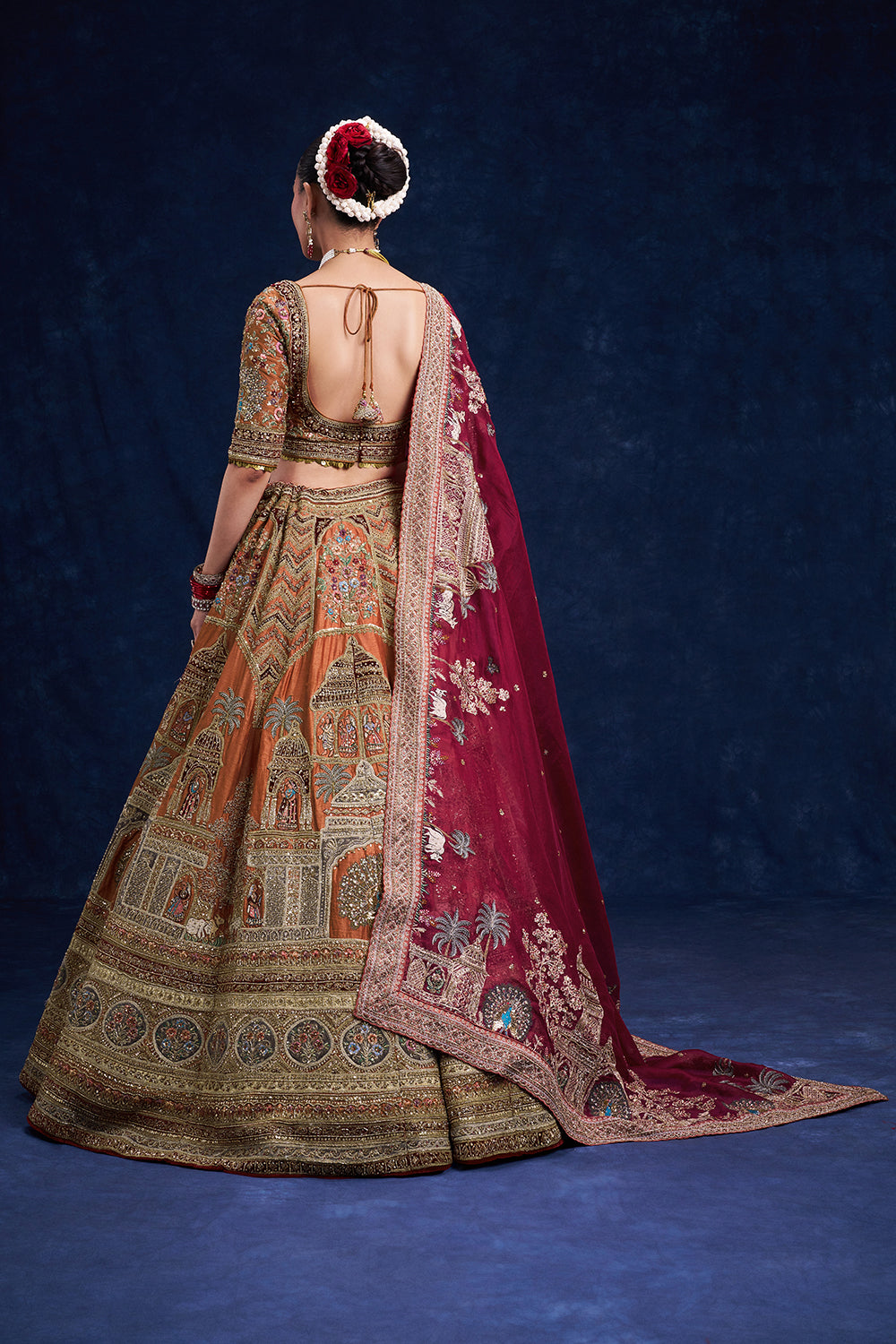 Rust Red Raw Silk Bridal Lehenga with Regal Zardozi Work