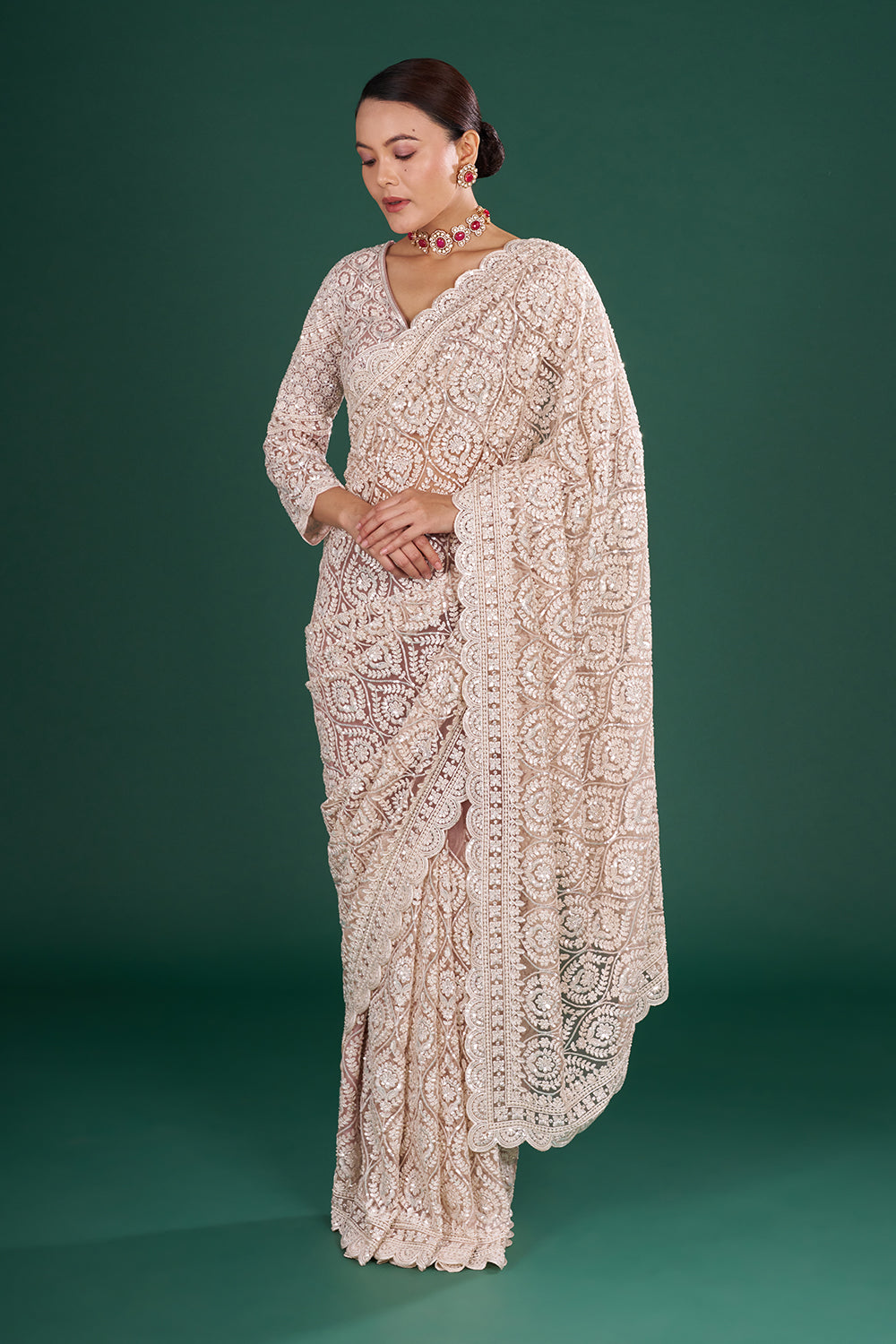 Powder Pink Net Saree with Scalloped Border and Stitched Blouse
