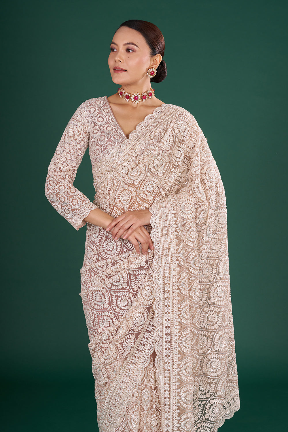 Powder Pink Net Saree with Scalloped Border and Stitched Blouse