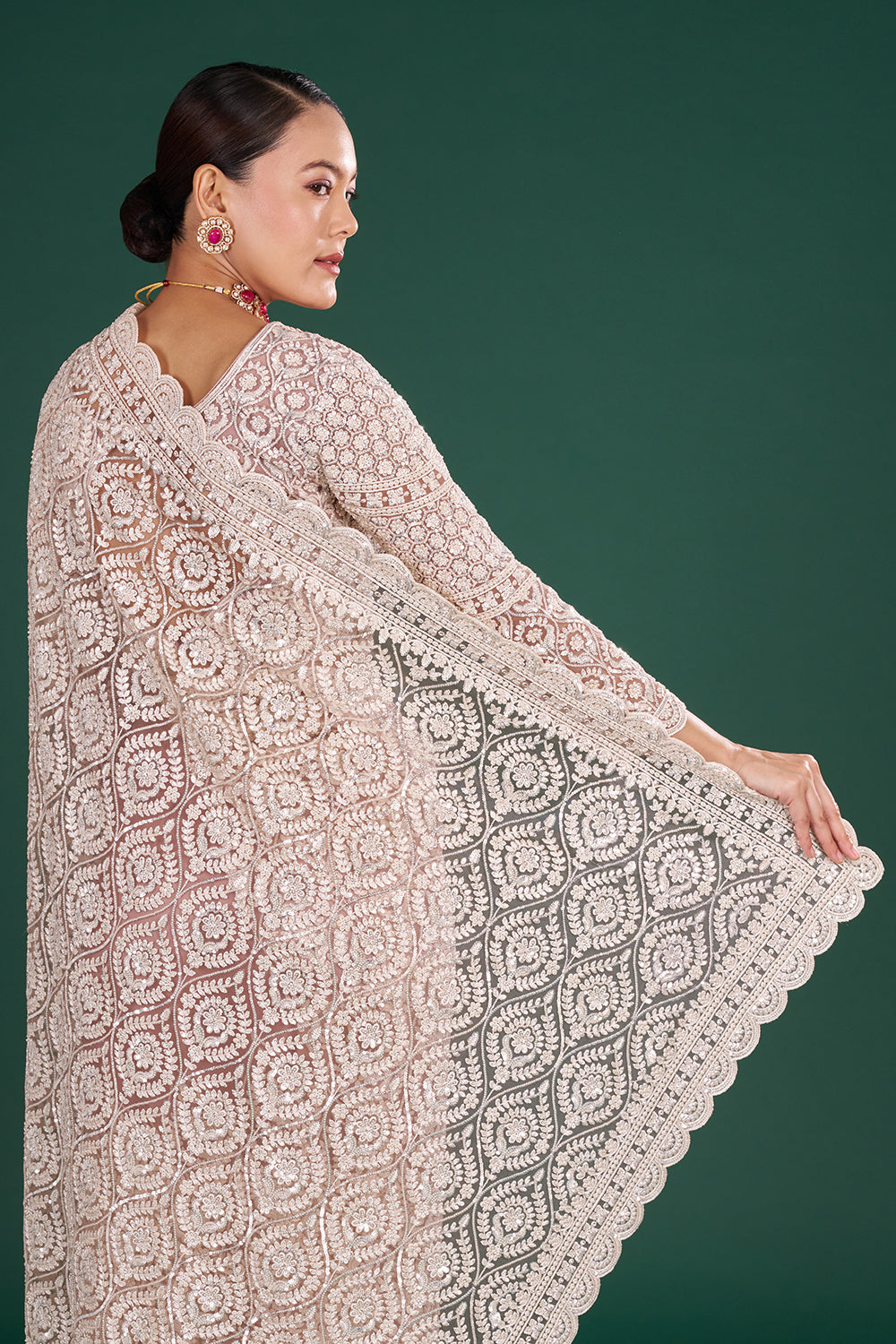 Powder Pink Net Saree with Scalloped Border and Stitched Blouse