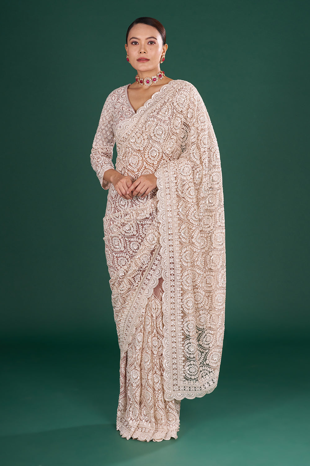 Powder Pink Net Saree with Scalloped Border and Stitched Blouse
