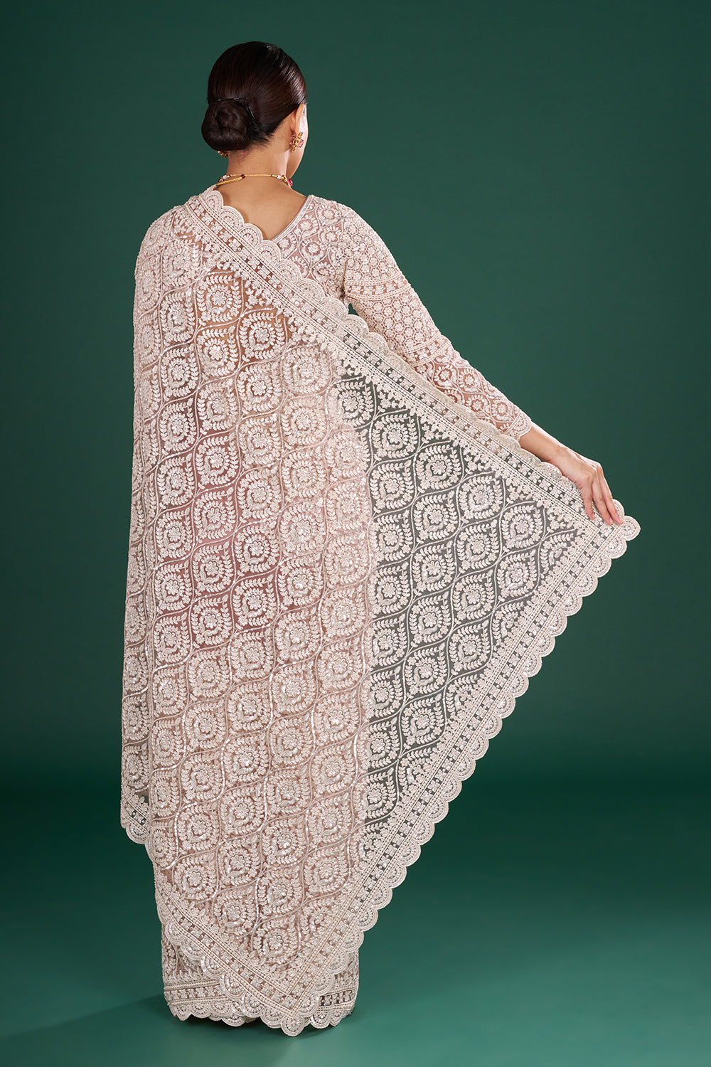 Powder Pink Net Saree with Scalloped Border and Stitched Blouse