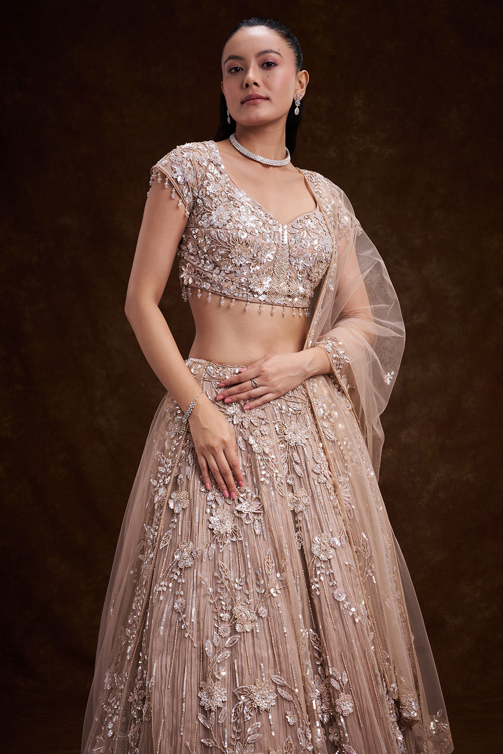 Sand Gold Net Bridal Lehenga with 3D Floral Embellishments