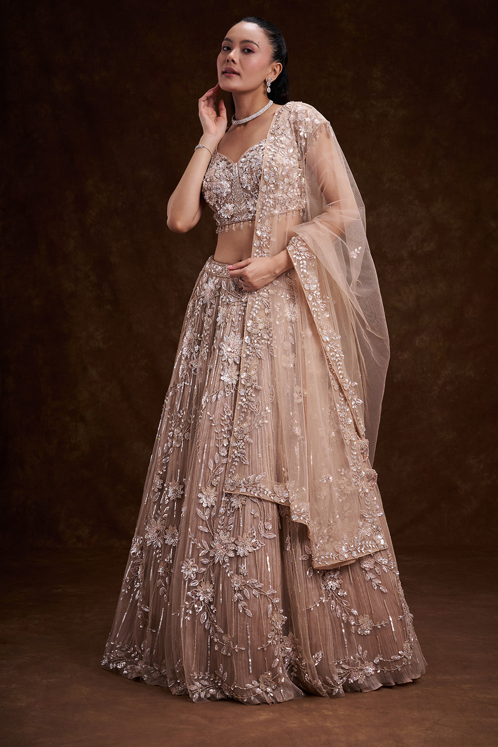 Sand Gold Net Bridal Lehenga with 3D Floral Embellishments