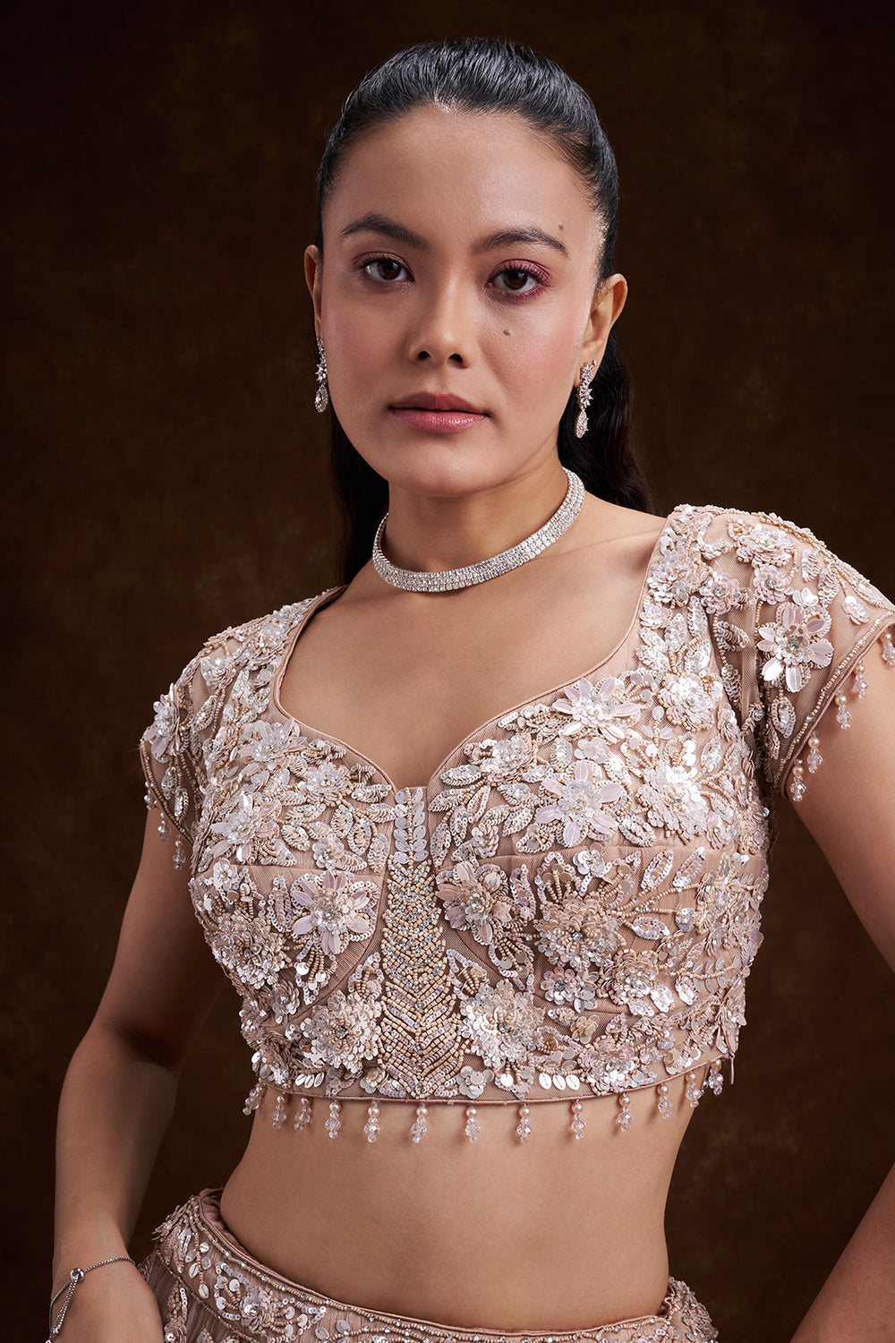 Sand Gold Net Bridal Lehenga with 3D Floral Embellishments
