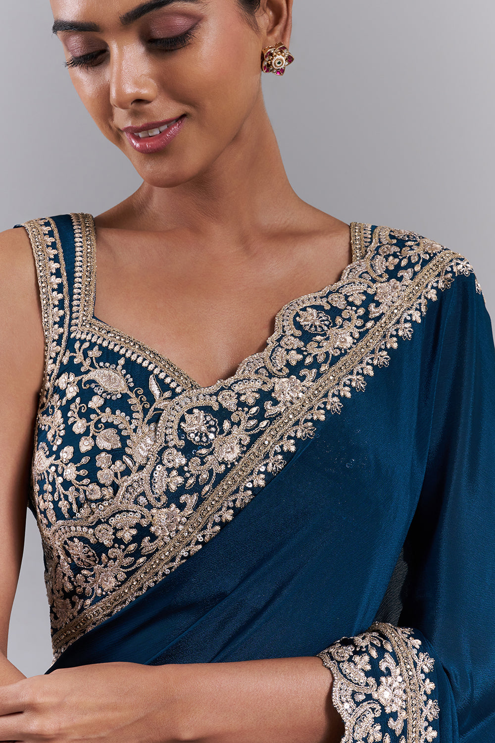 Teal Blue Chiffon Embroidered Saree And Stitched Blouse