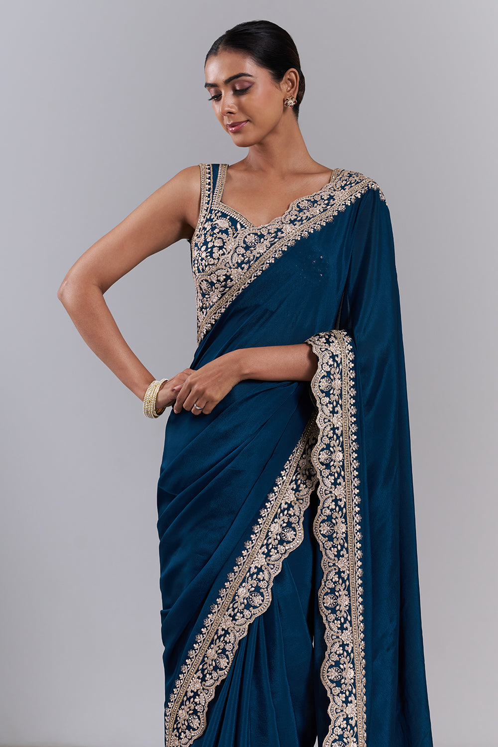Teal Blue Chiffon Embroidered Saree And Stitched Blouse