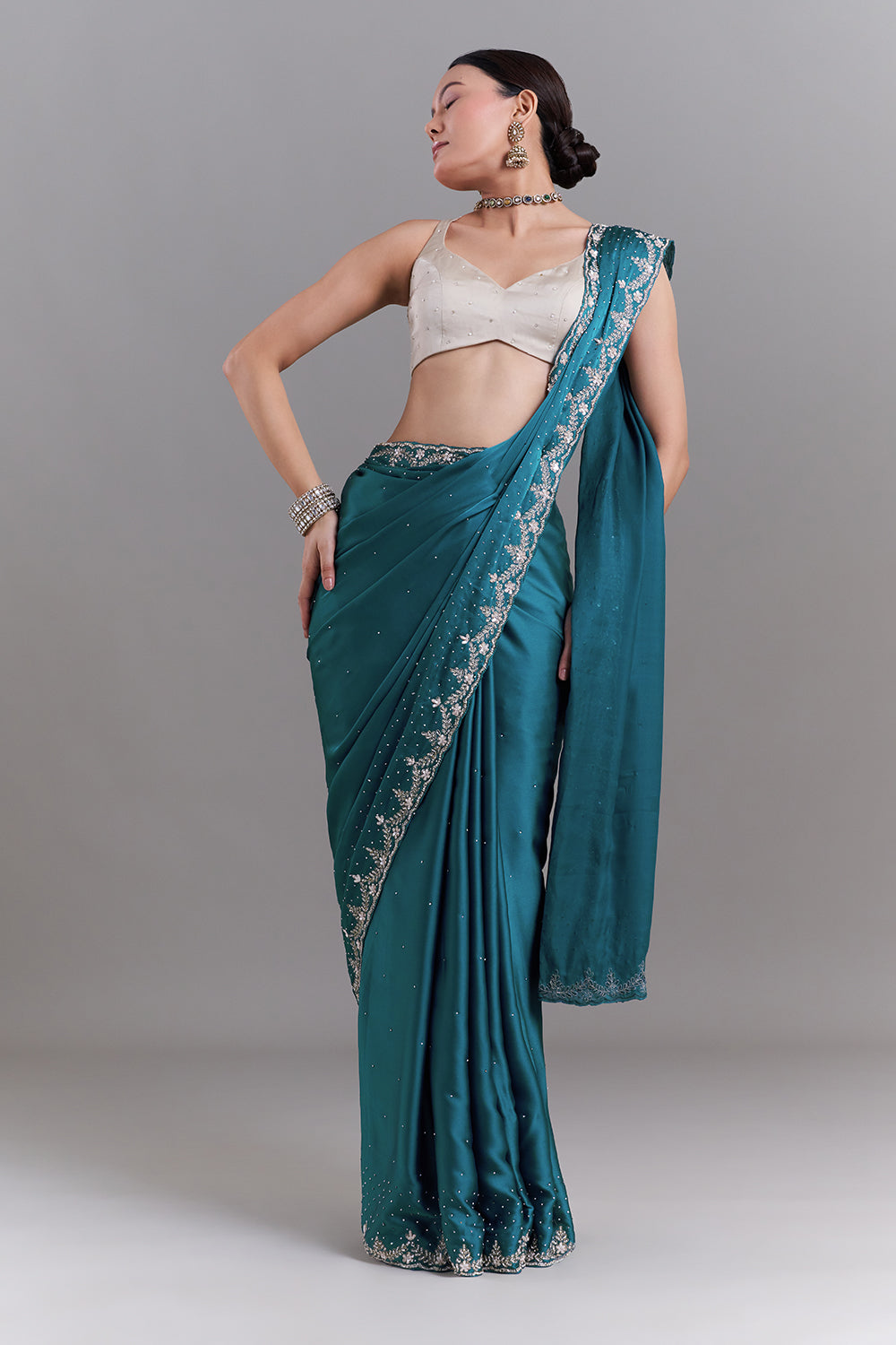Teal Blue Satin Saree With Ornate Floral Embellishments