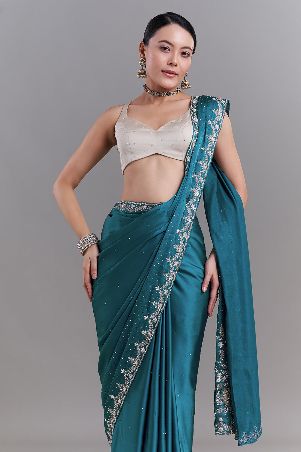 Teal Blue Satin Saree With Ornate Floral Embellishments