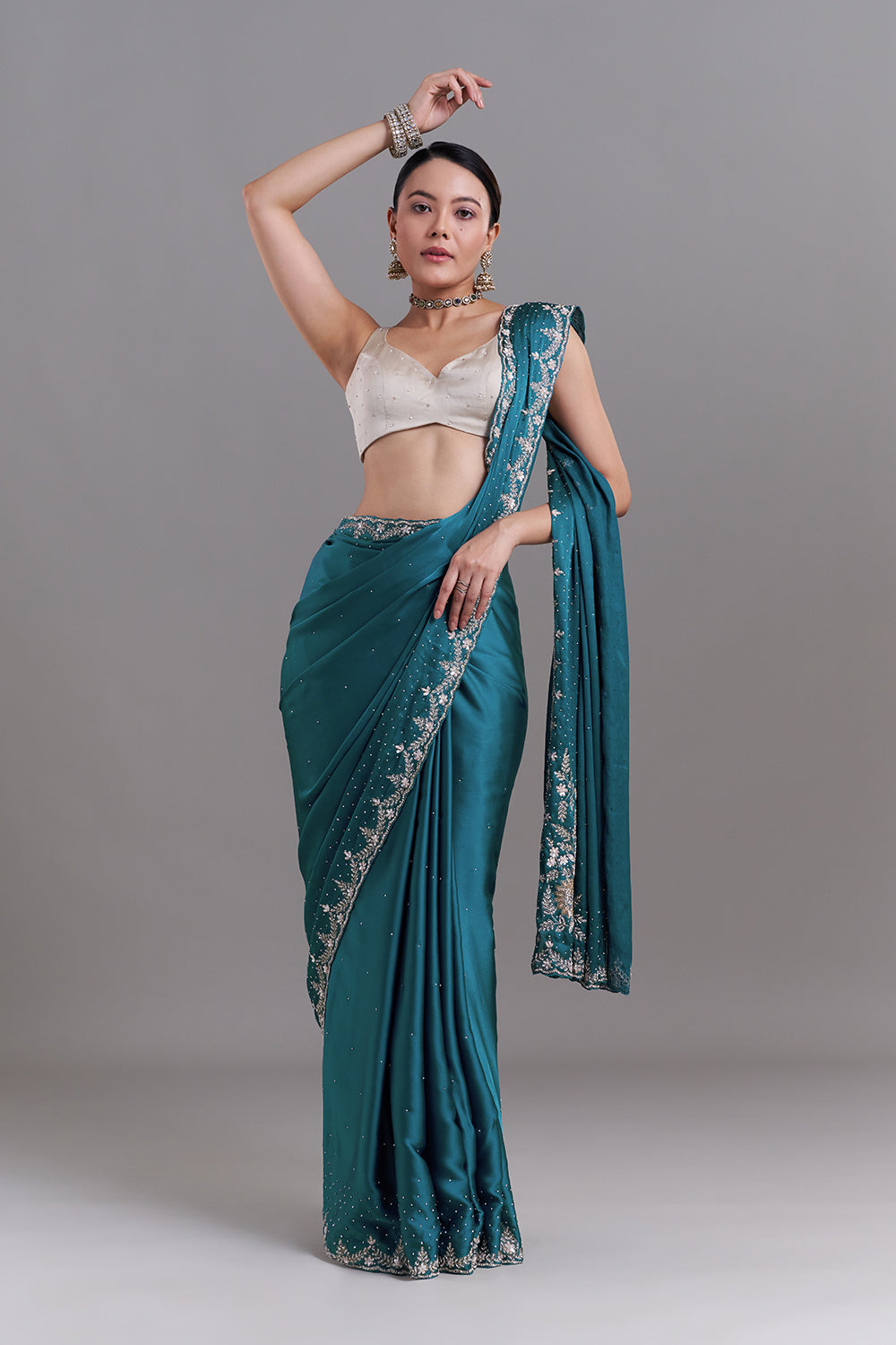 Teal Blue Satin Saree With Ornate Floral Embellishments