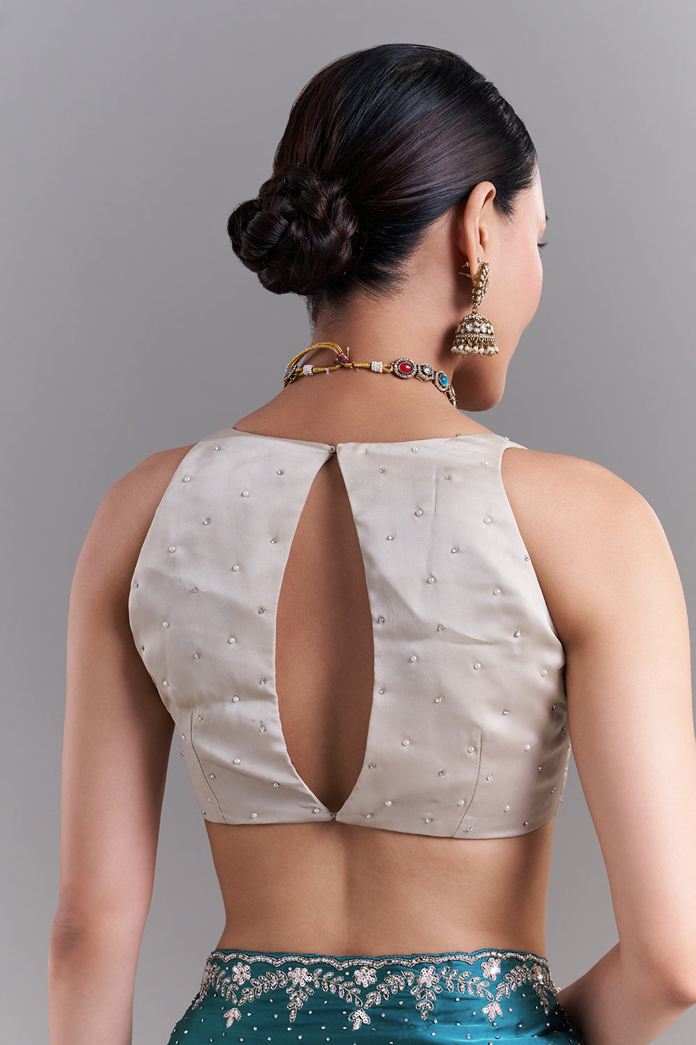 Teal Blue Satin Saree With Ornate Floral Embellishments