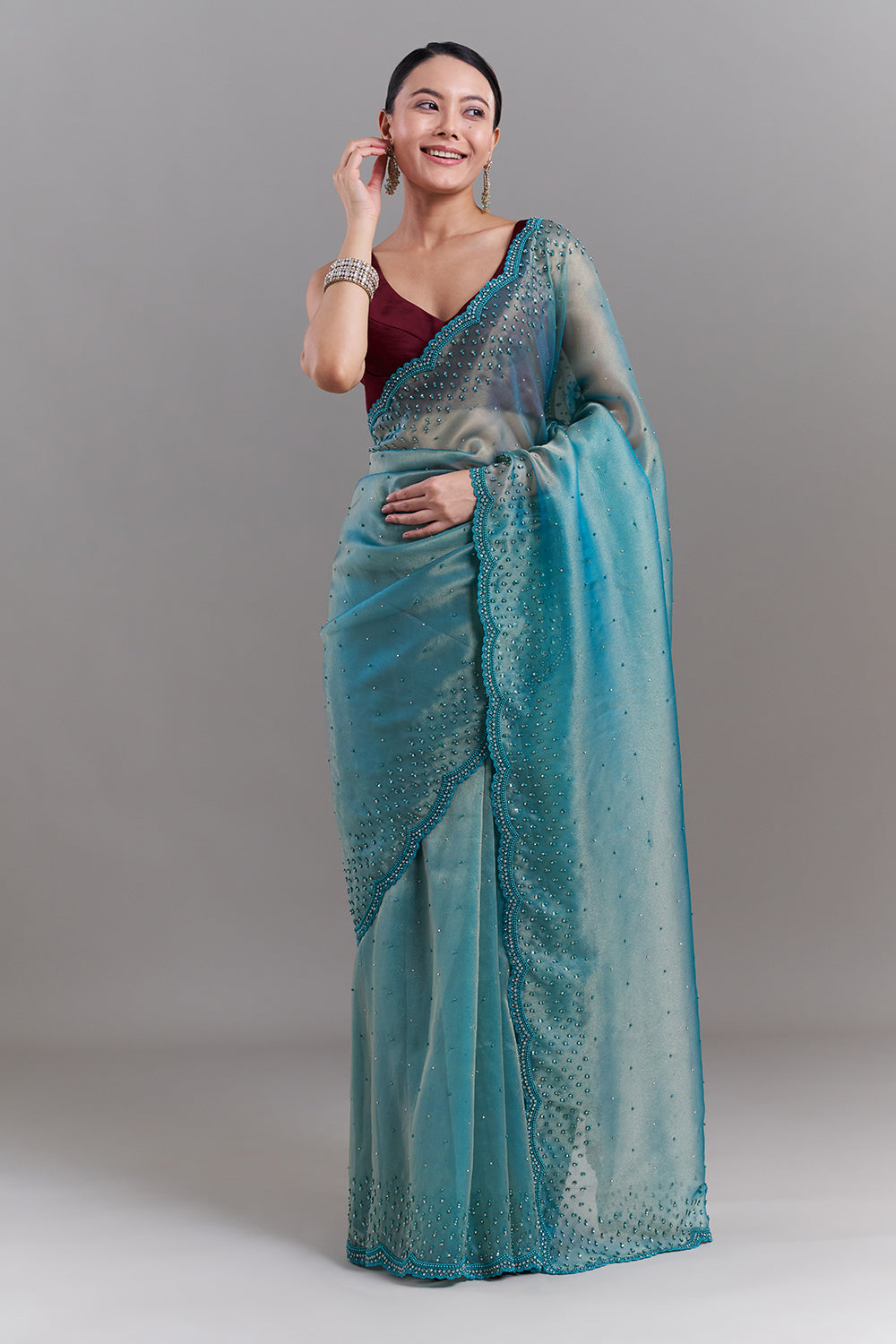 Teal Green Shimmer Organza Embellished Saree