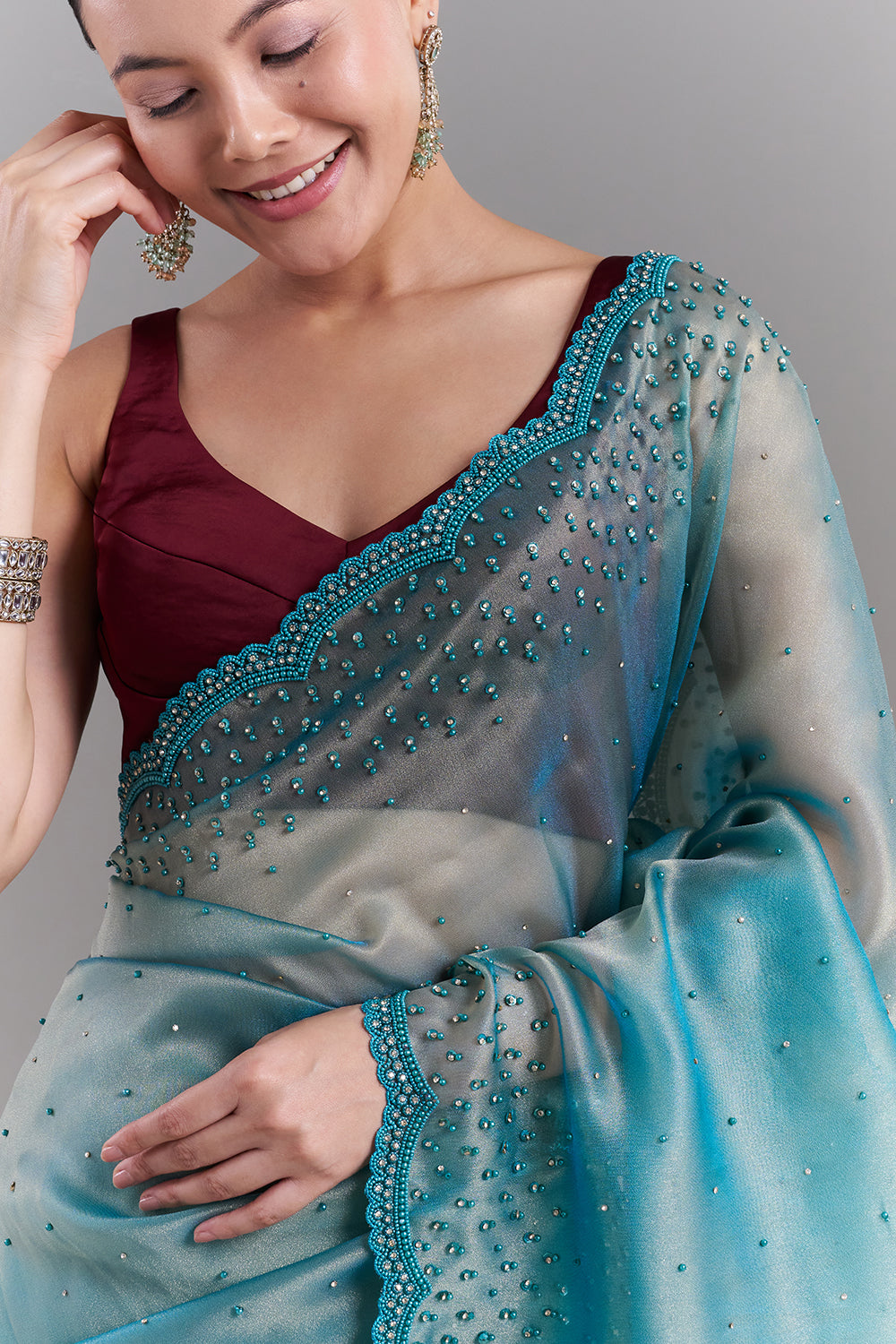 Teal Green Shimmer Organza Embellished Saree