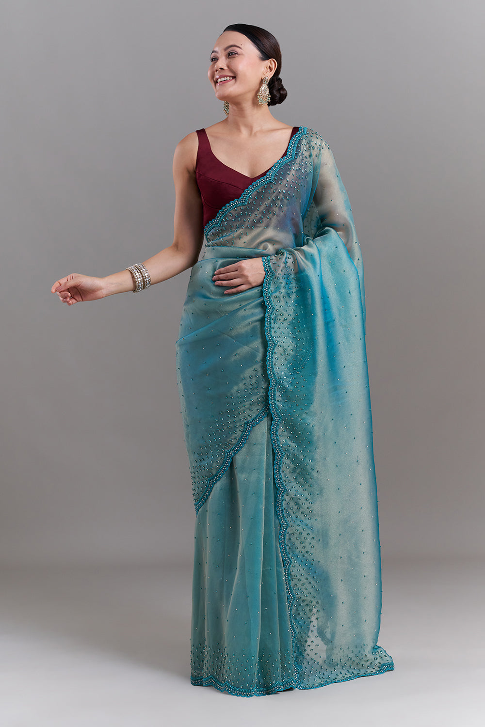Teal Green Shimmer Organza Embellished Saree