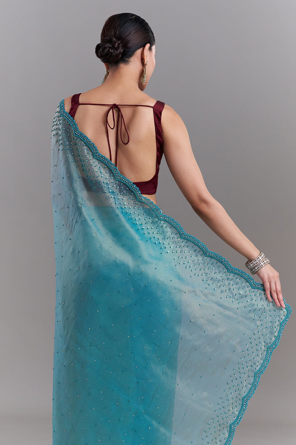 Teal Green Shimmer Organza Embellished Saree