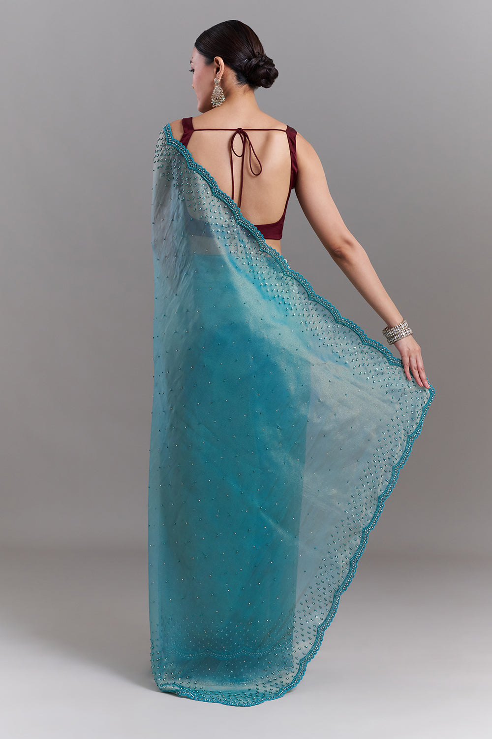 Teal Green Shimmer Organza Embellished Saree