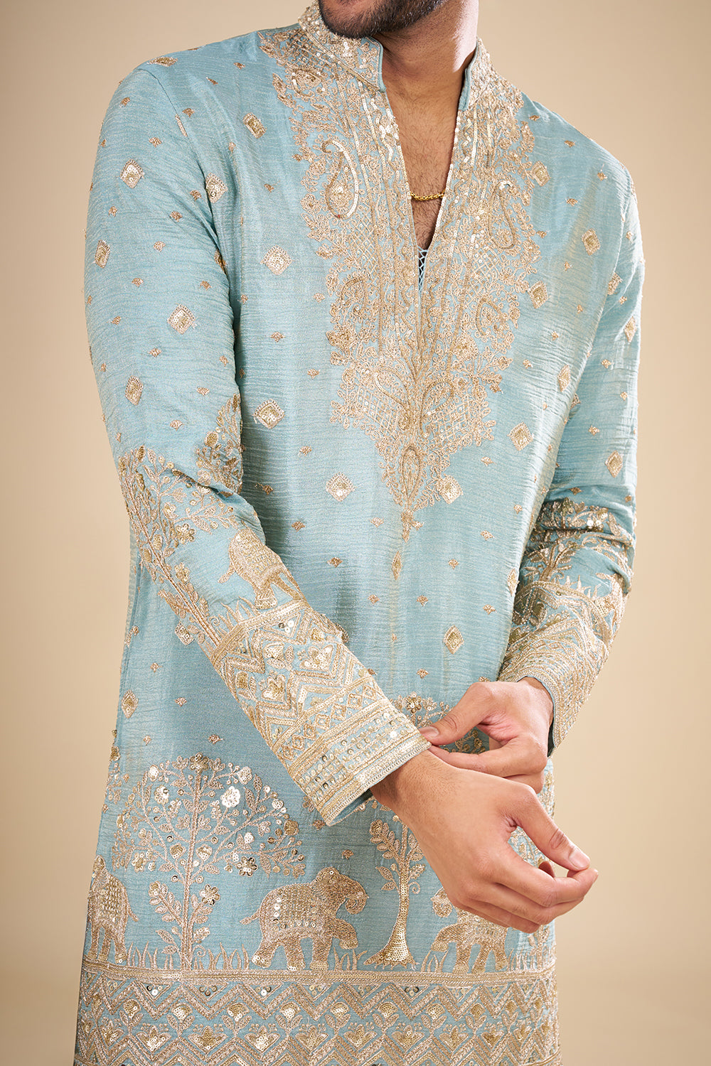 Turquoise Blue Silk Kurta Set with Nature-Inspired Embroidery