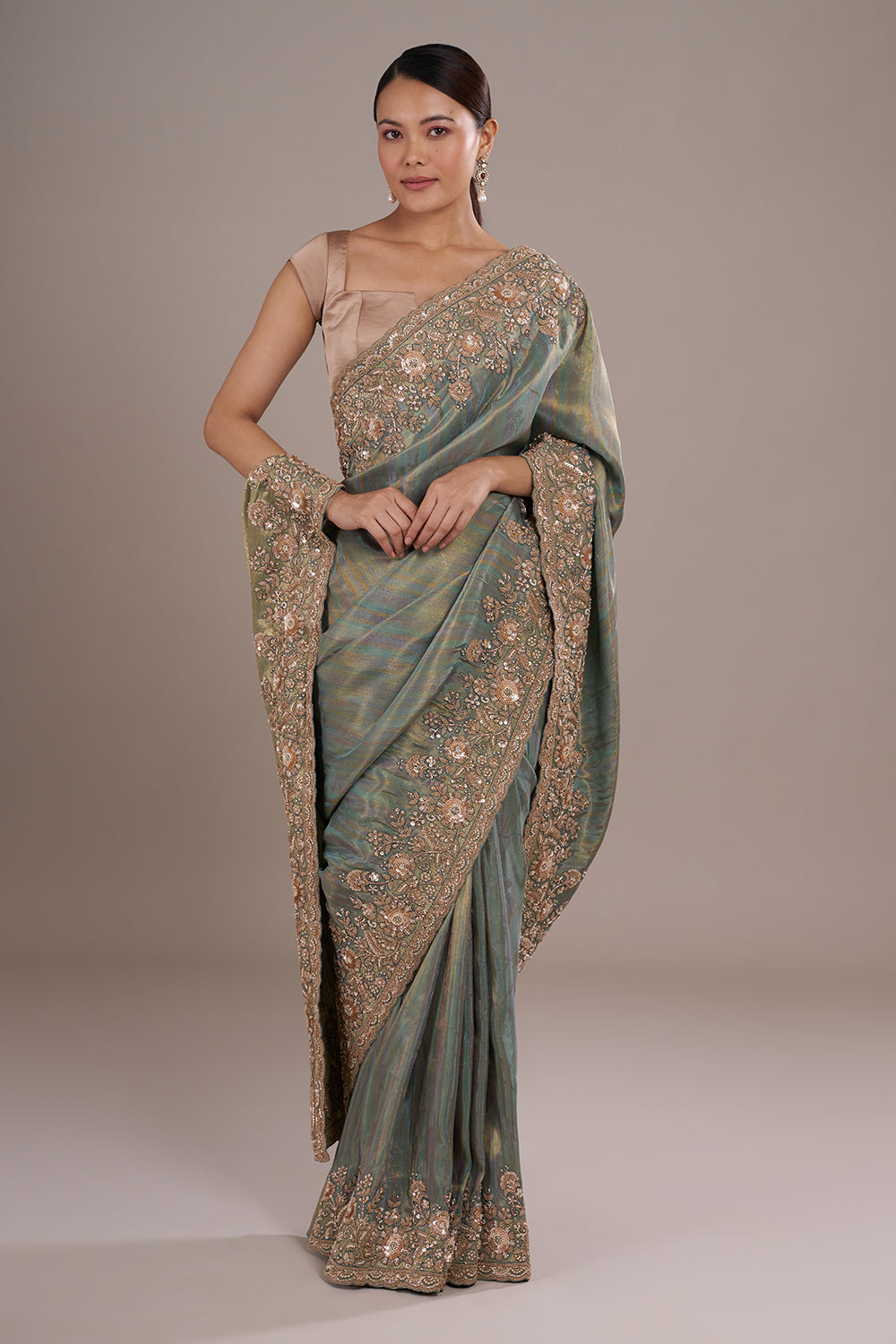 Teal Tissue Silk Saree with Bead Detailing and Unstitched Blouse