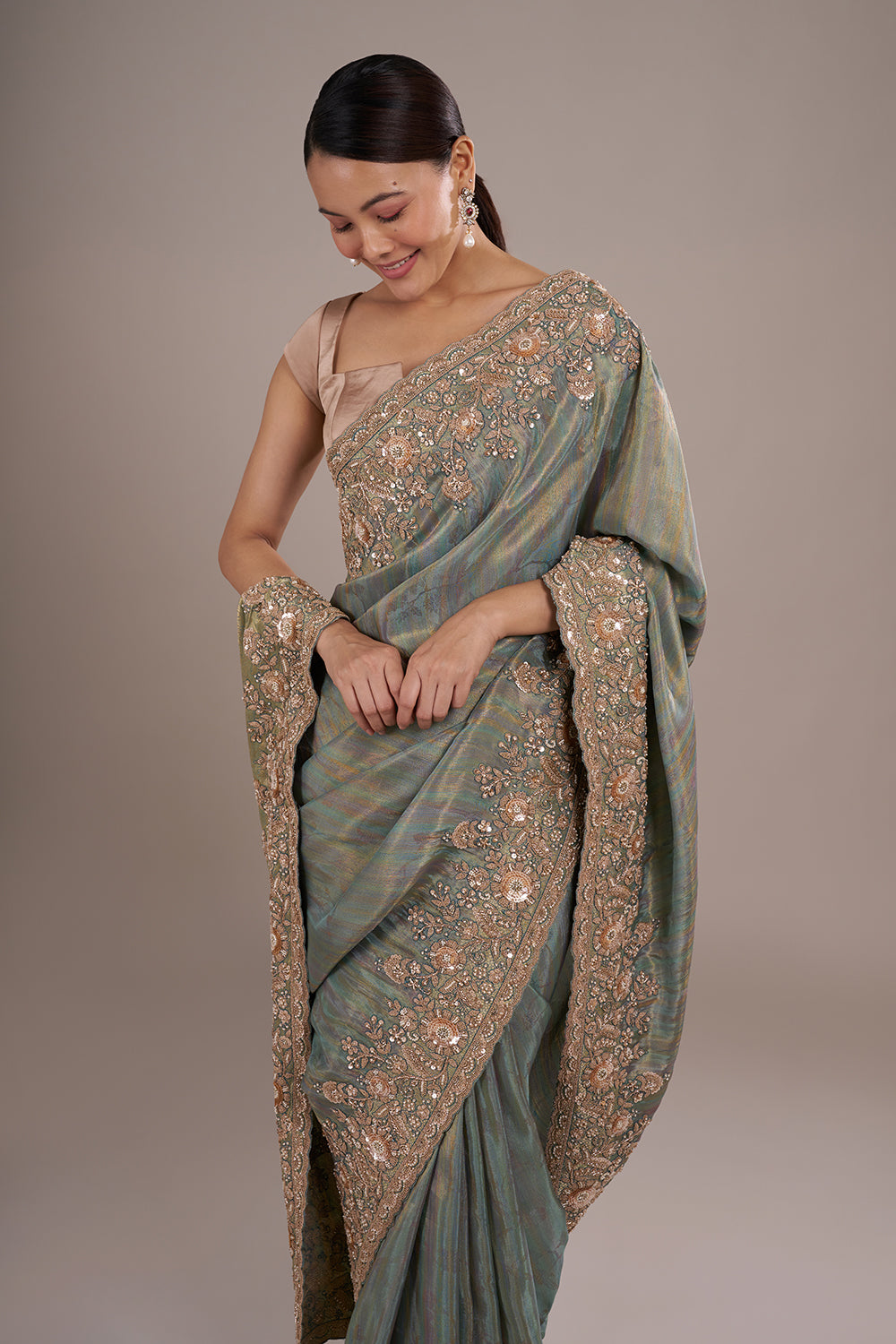 Teal Tissue Silk Saree with Bead Detailing and Unstitched Blouse