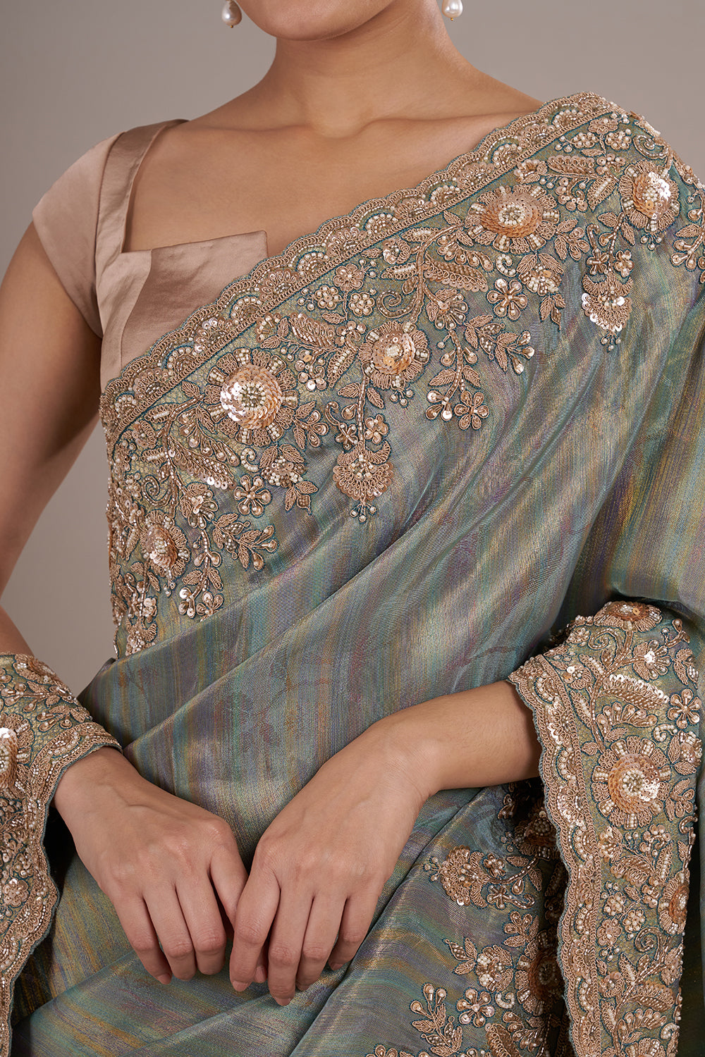 Teal Tissue Silk Saree with Bead Detailing and Unstitched Blouse