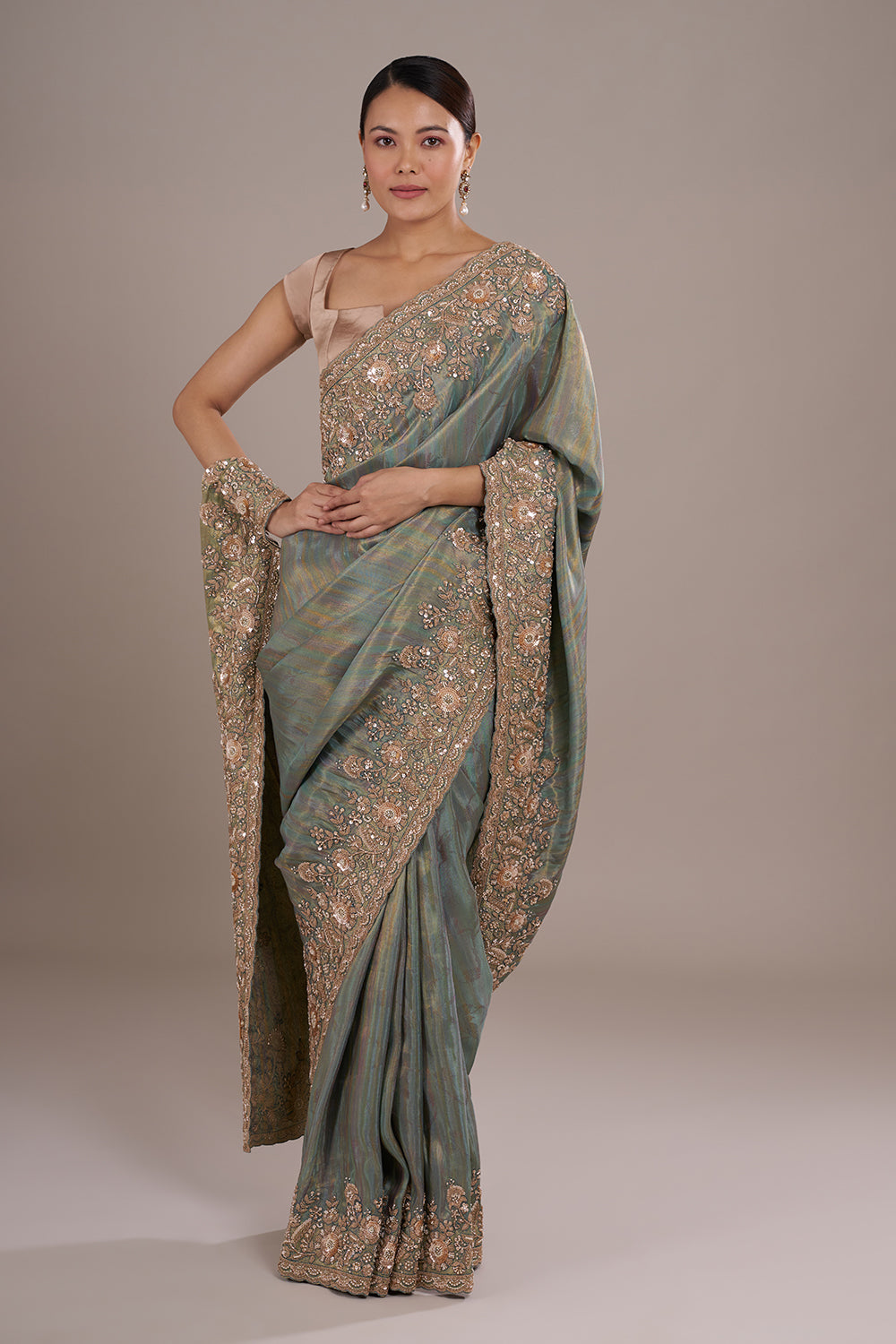 Teal Tissue Silk Saree with Bead Detailing and Unstitched Blouse