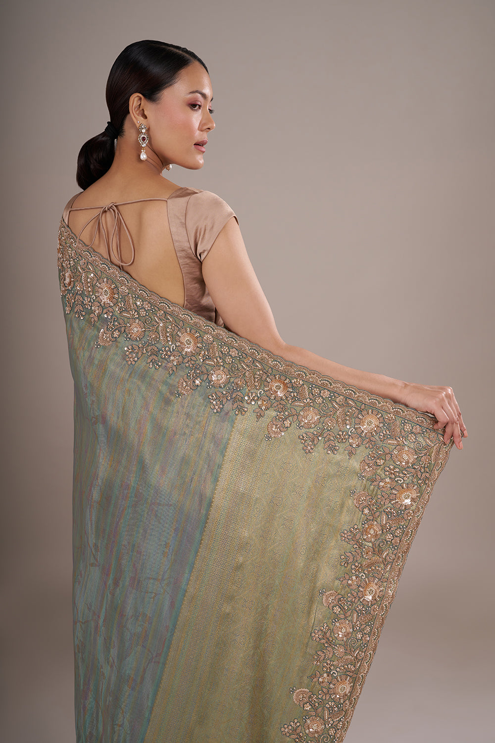 Teal Tissue Silk Saree with Bead Detailing and Unstitched Blouse