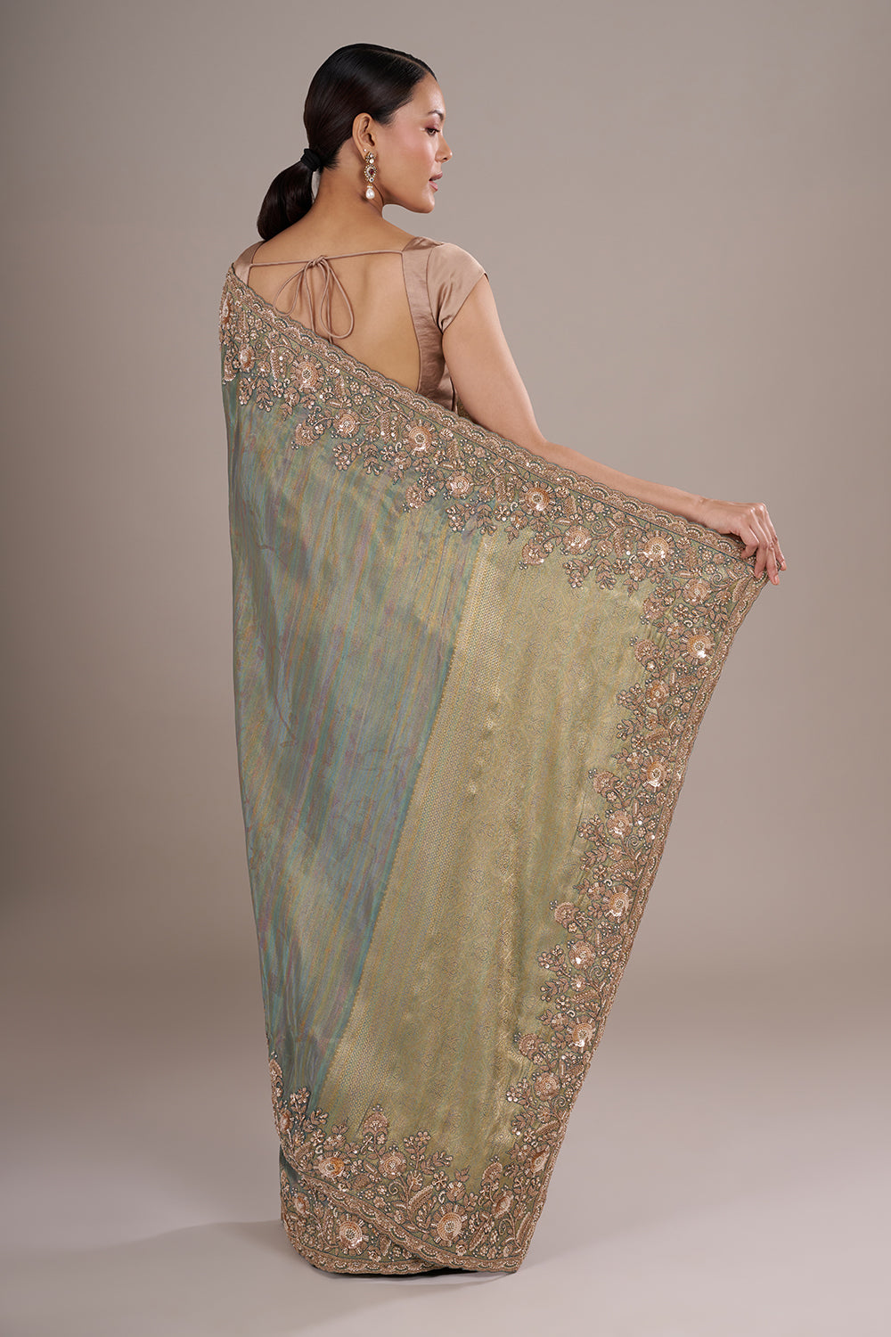 Teal Tissue Silk Saree with Bead Detailing and Unstitched Blouse