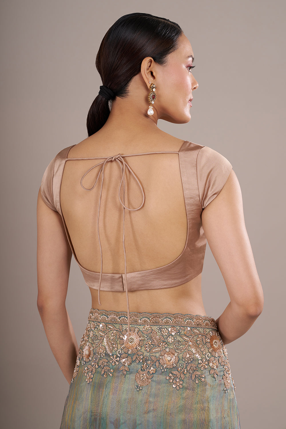 Teal Tissue Silk Saree with Bead Detailing and Unstitched Blouse