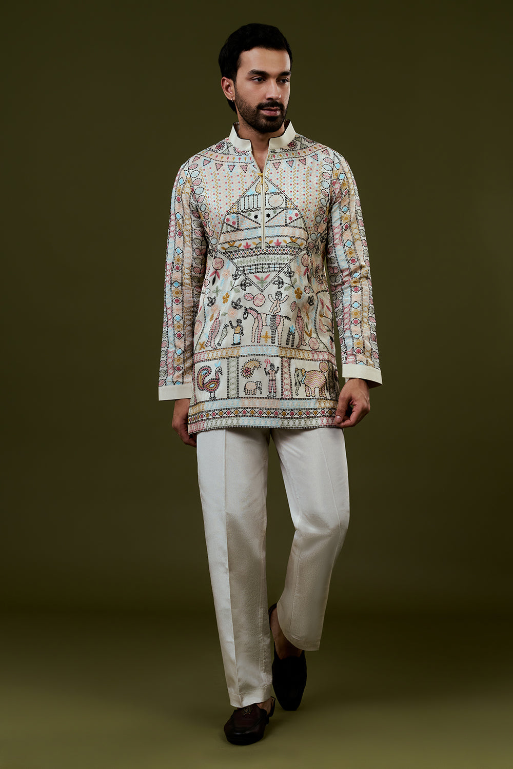 Cream Coloured Short Kurta with Folk Art Threadwork