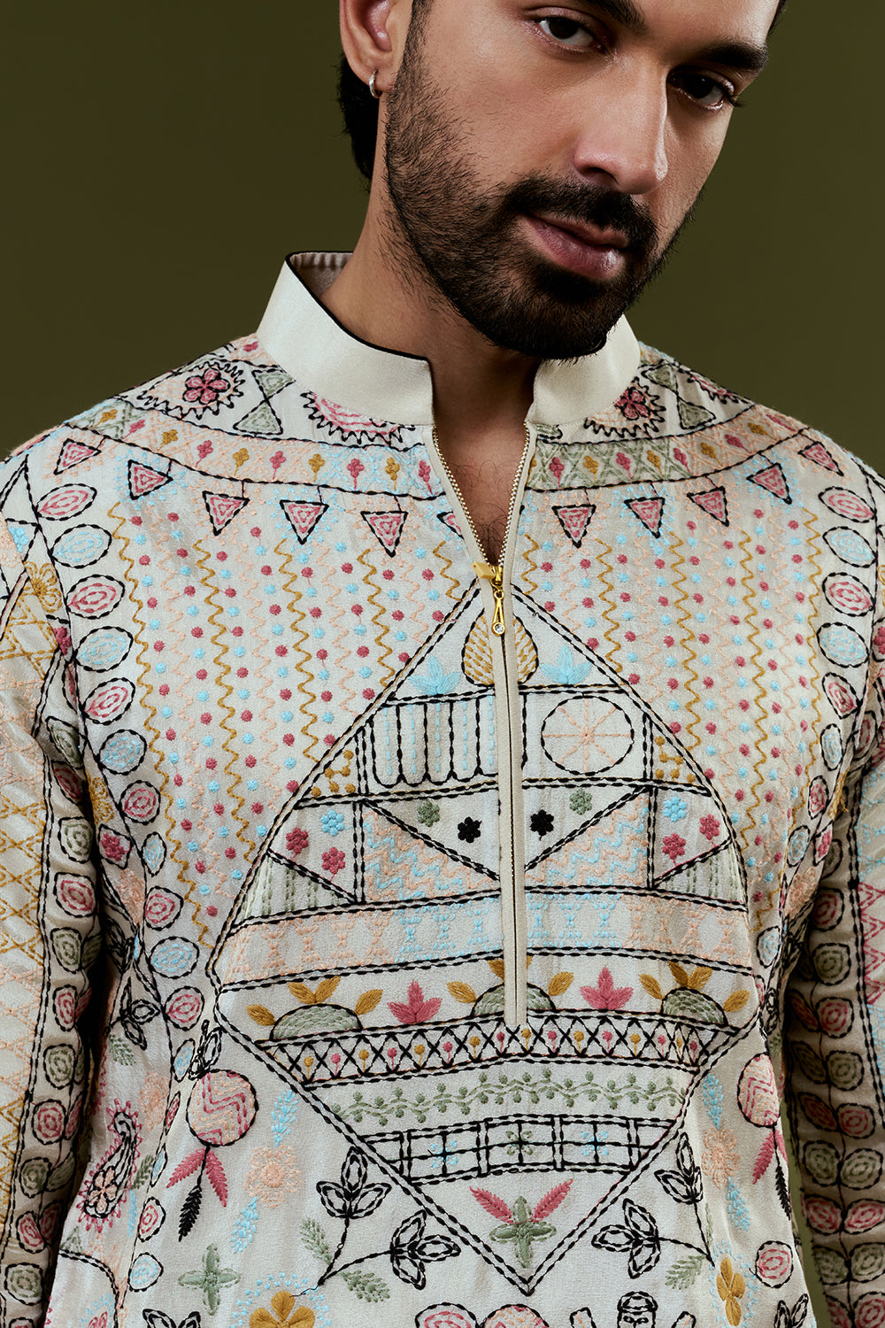 Cream Coloured Short Kurta with Folk Art Threadwork