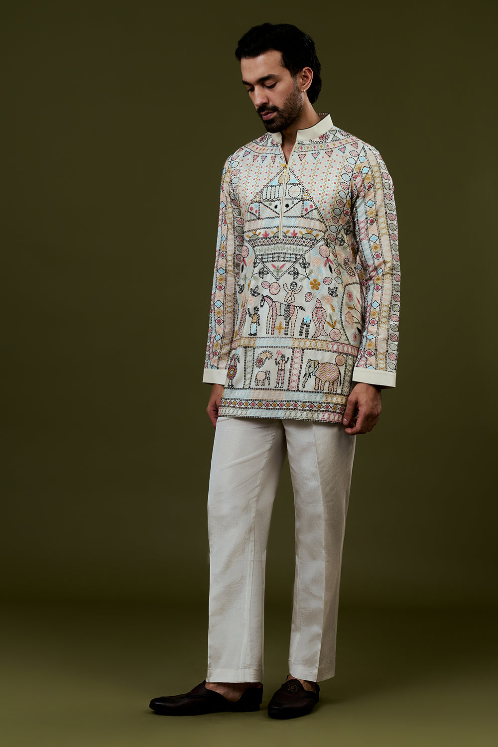 Cream Coloured Short Kurta with Folk Art Threadwork