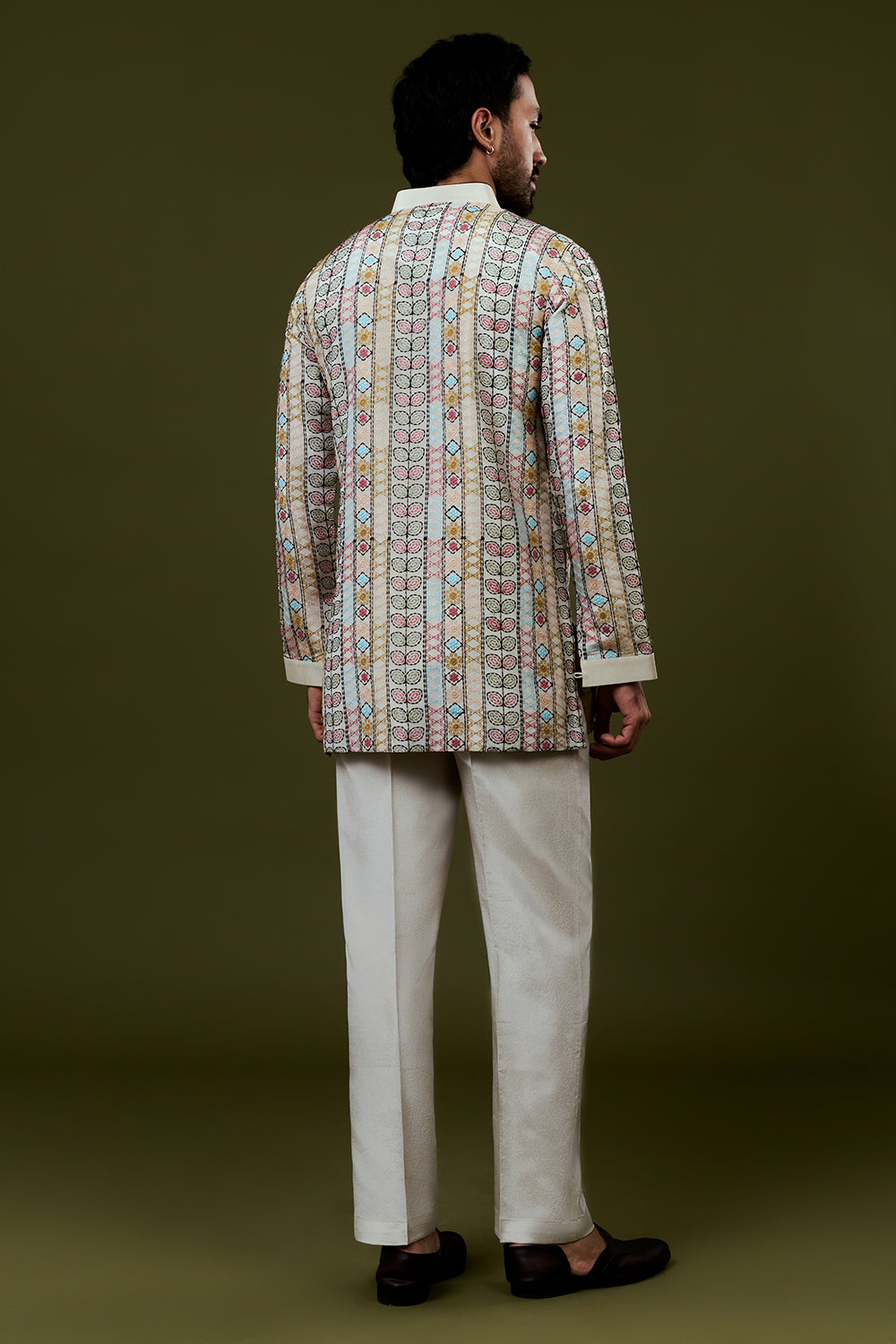 Cream Coloured Short Kurta with Folk Art Threadwork