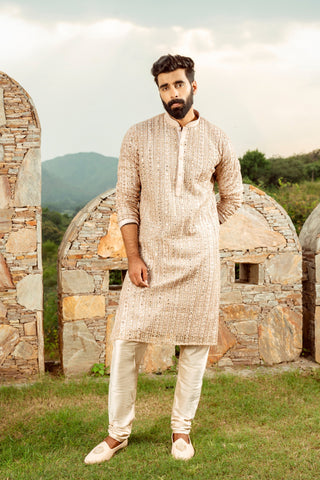 Pale Peach Silk Kurta Set With Mirror And Thread Work