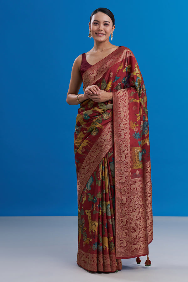 Maroon Silk Saree with Animal-Inspired Motifs Border And Unstitched Blouse