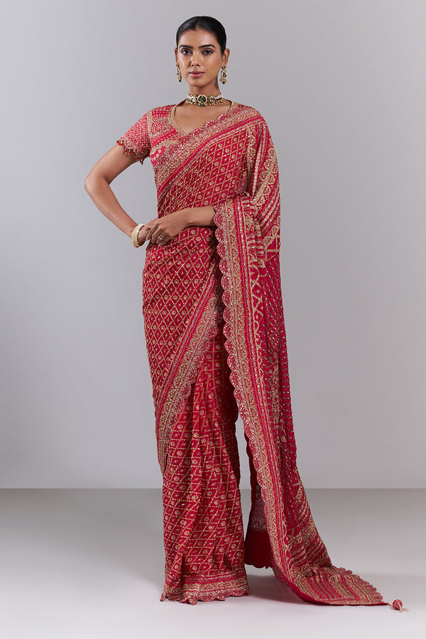 Rani Pink Georgette Embellished Saree And Stitched Blouse