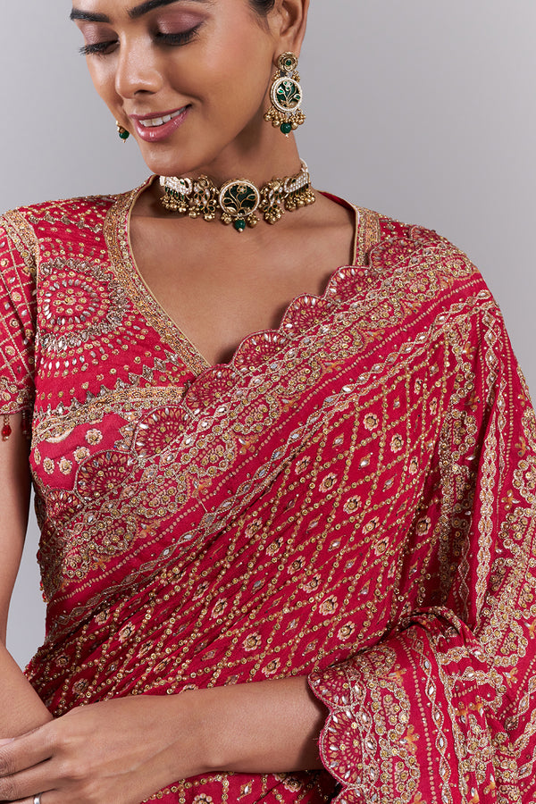 Rani Pink Georgette Embellished Saree And Stitched Blouse